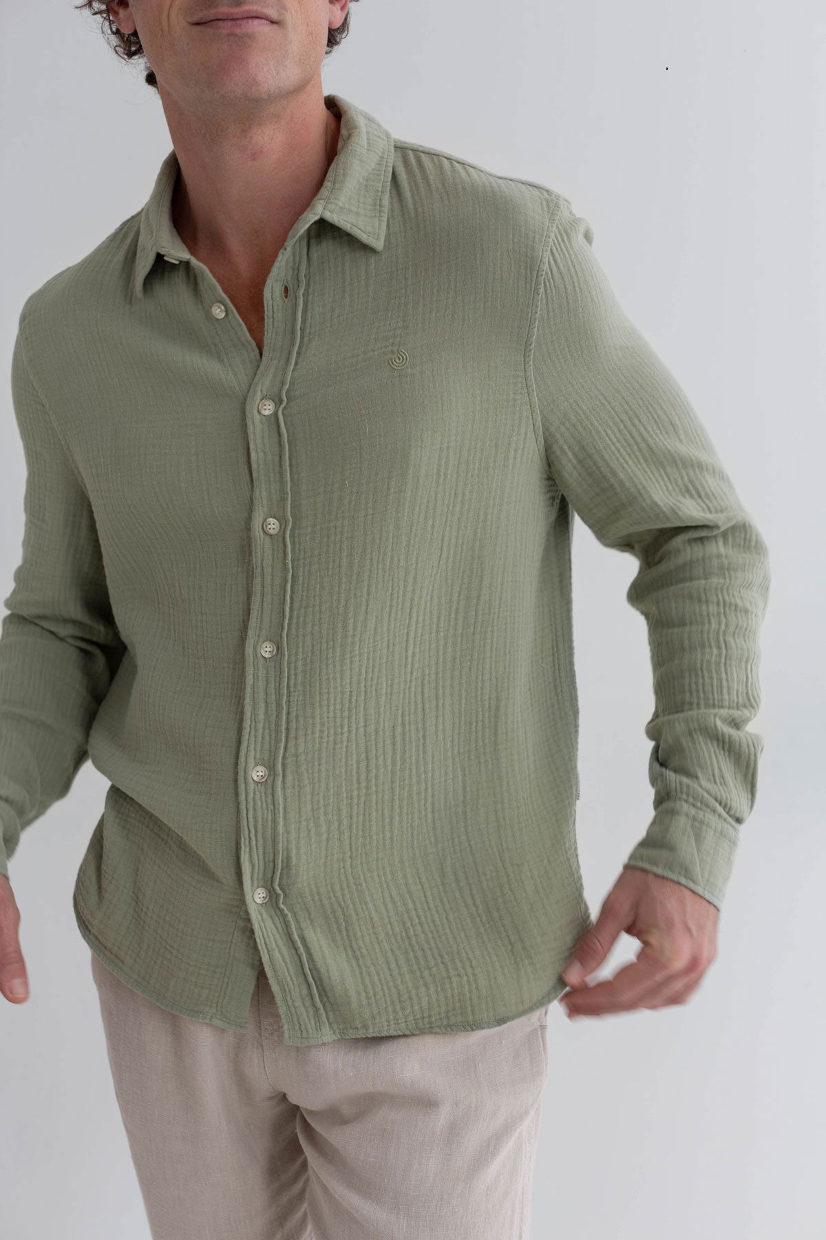 Light green muslin shirt men light pants wear view front