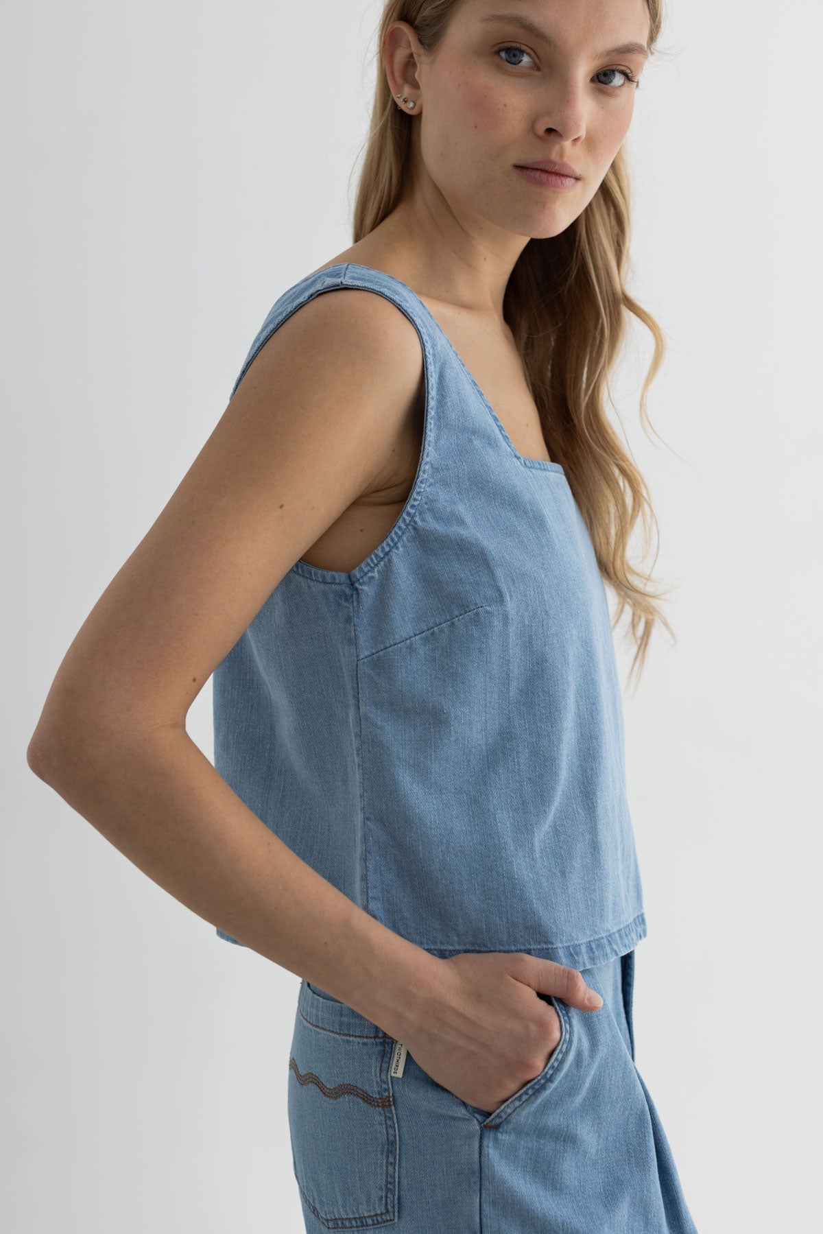 Light blue denim shirt women wear view side