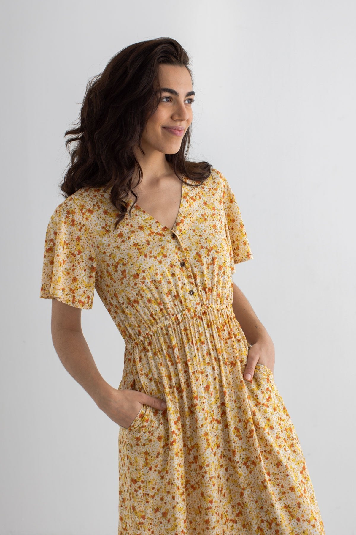 Golden flowers print dress women wear view front