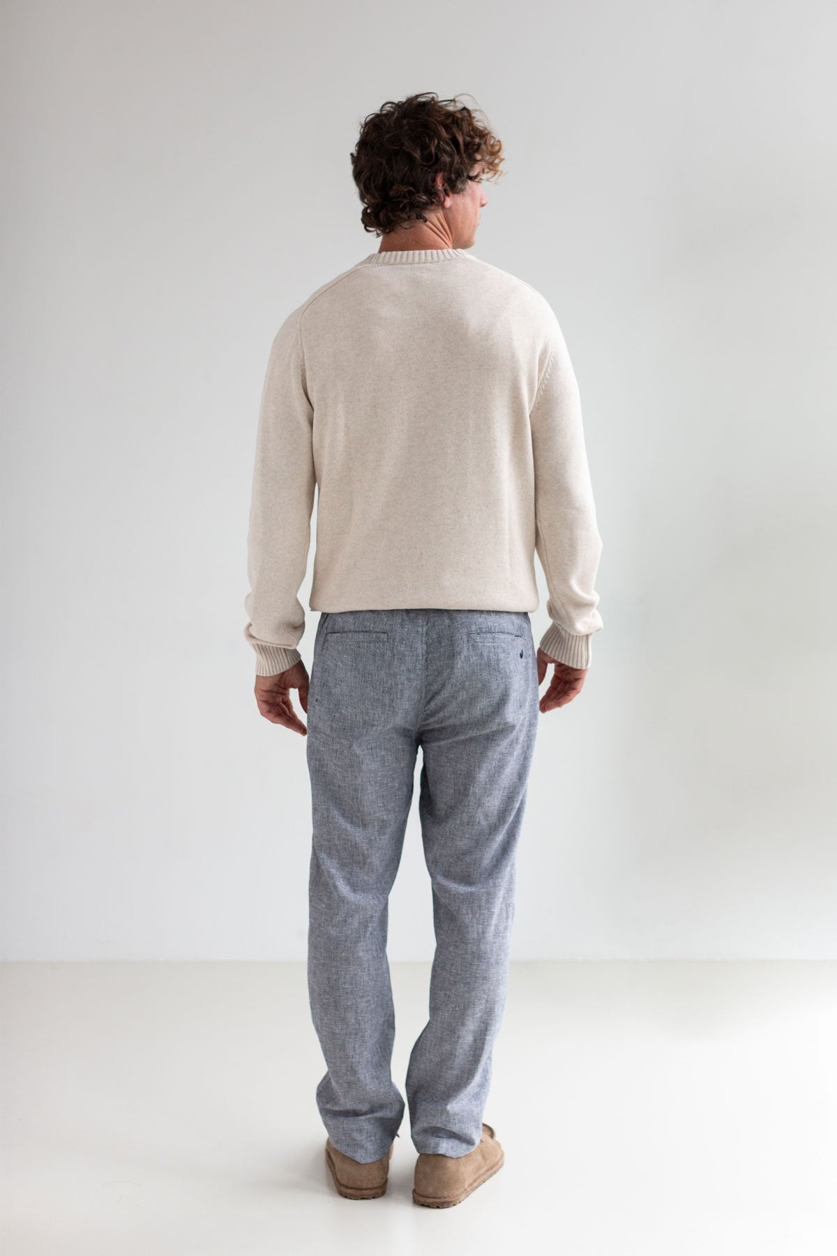 Ecru jersey knit men striped pants full body view back