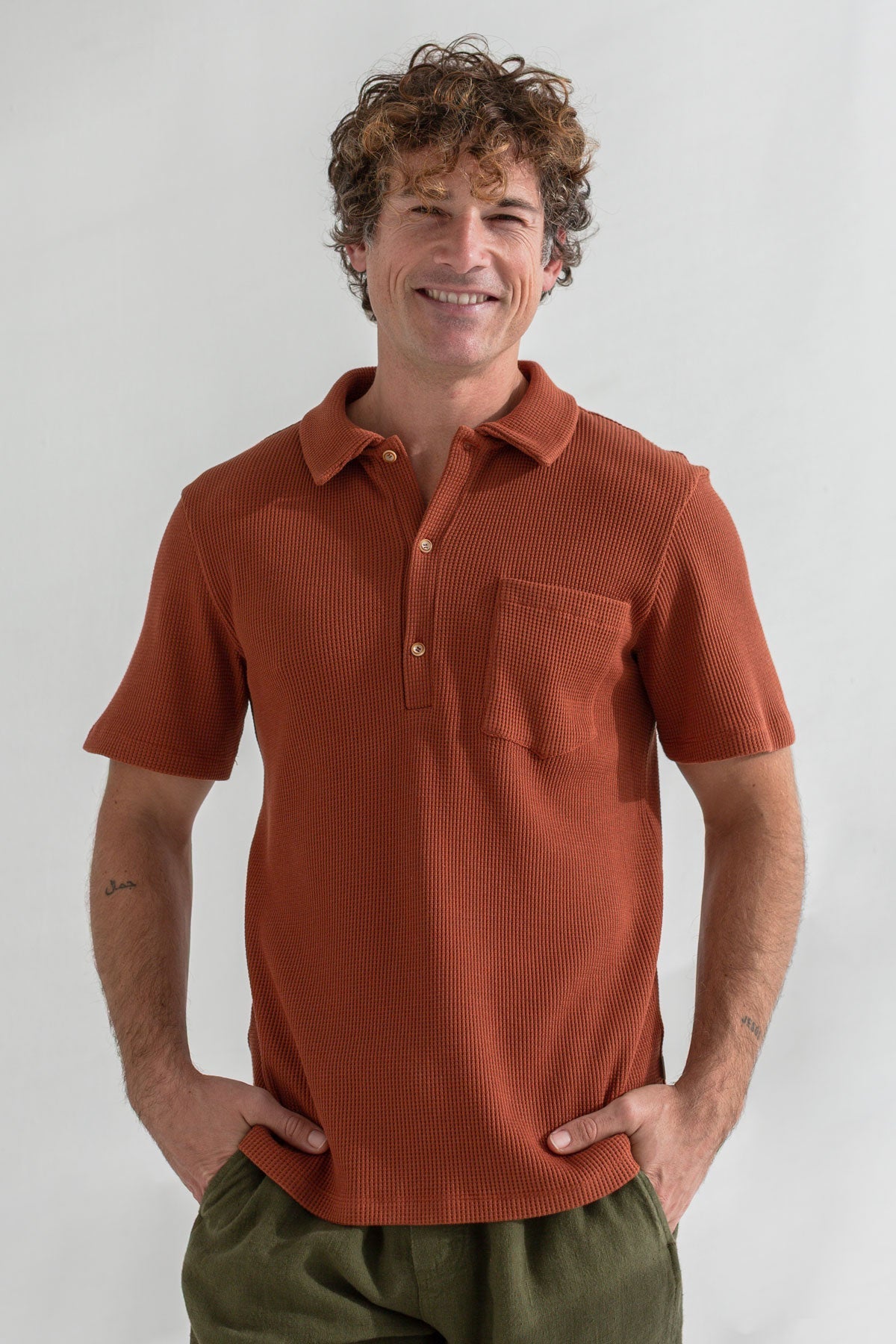 Coconut shell classic polo shirt men green pants wear view front