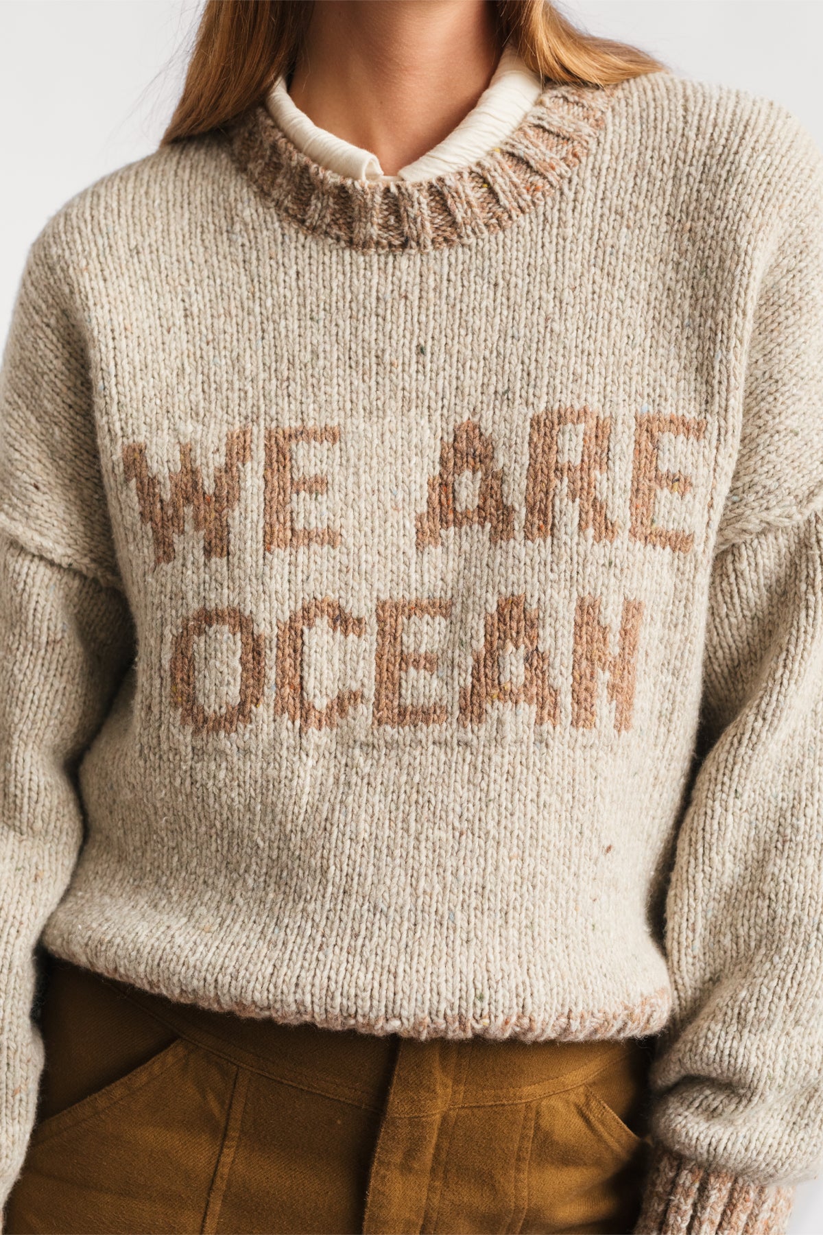 meta-preview, sustainable beige knit with mulesing-free wool