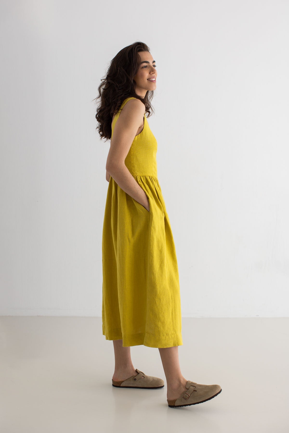 Golden green linen dress women full body view side