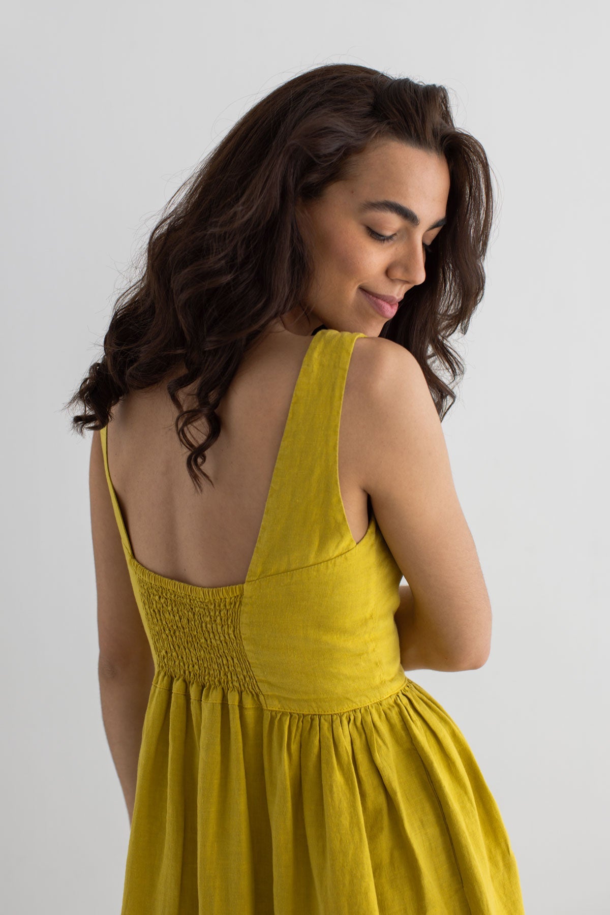Golden green linen dress women wear view back