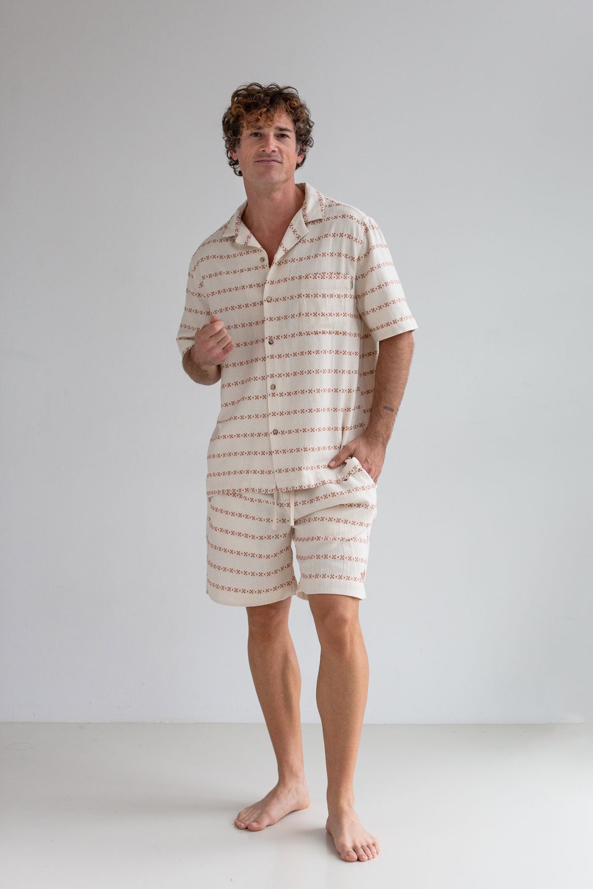 Ecru shorts men patterned shirt full body view front