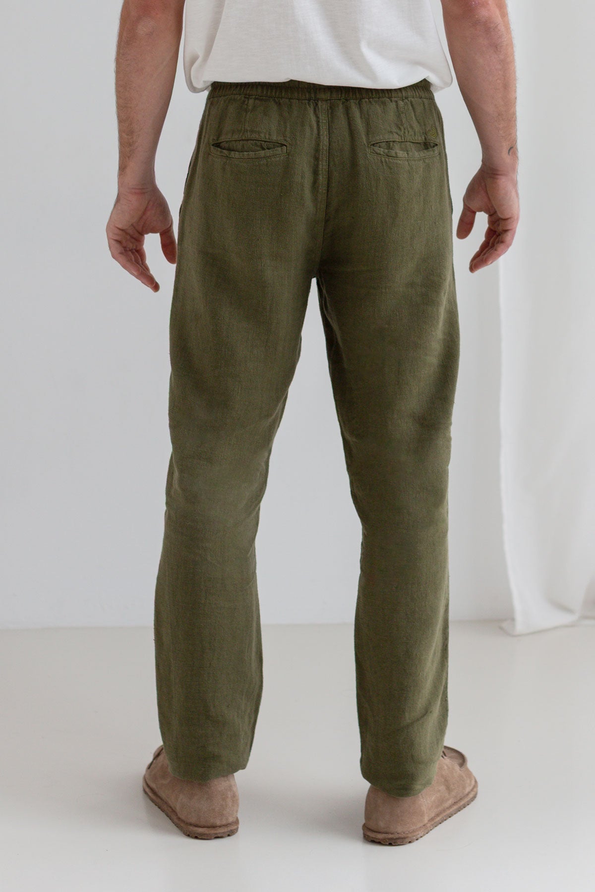 Codium green heavy linen pants men wear view back