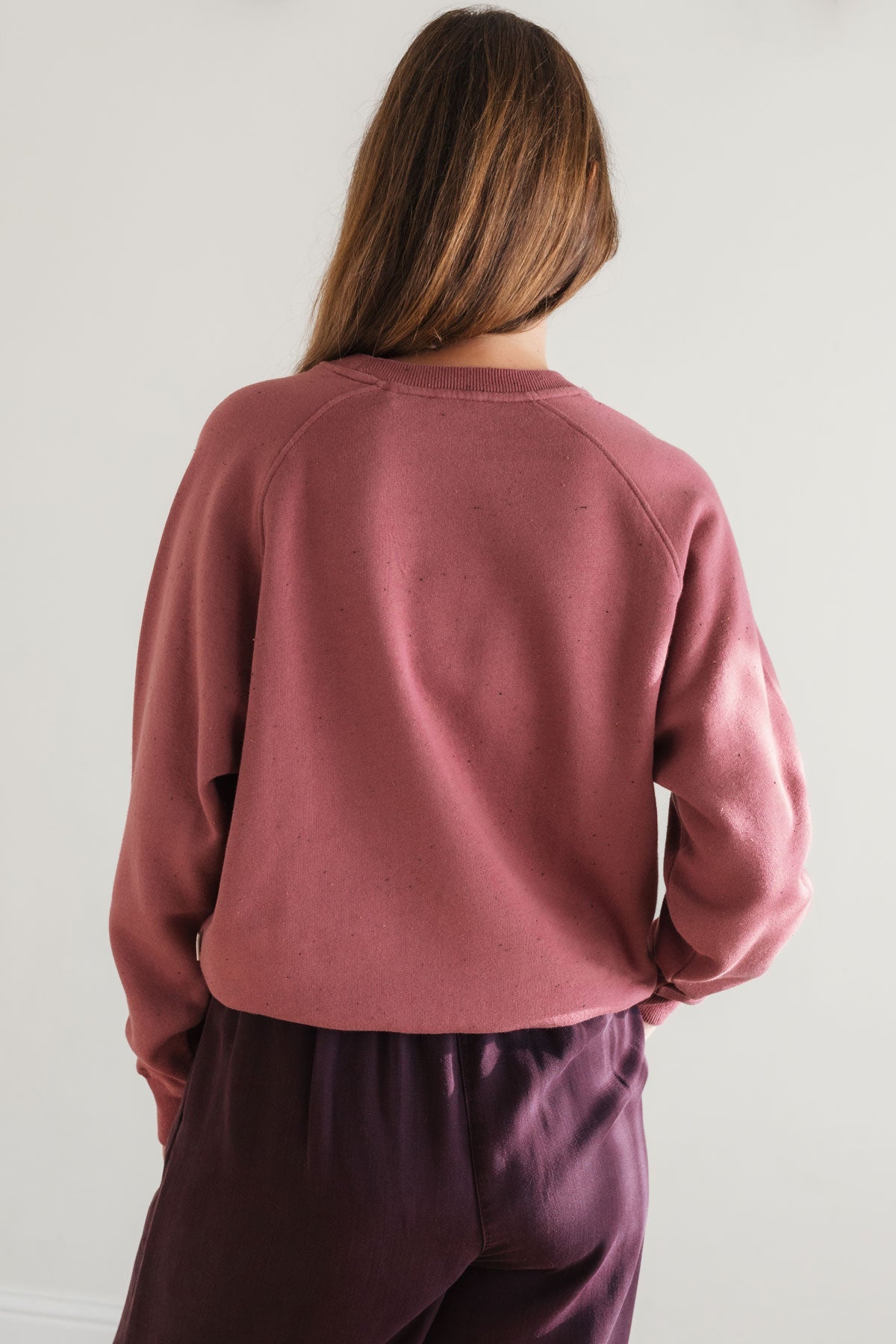 Eco-conscious crewneck in warm red