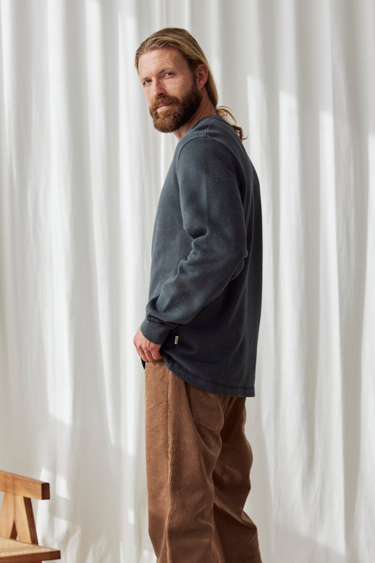 Eco-friendly black speckled jumper
