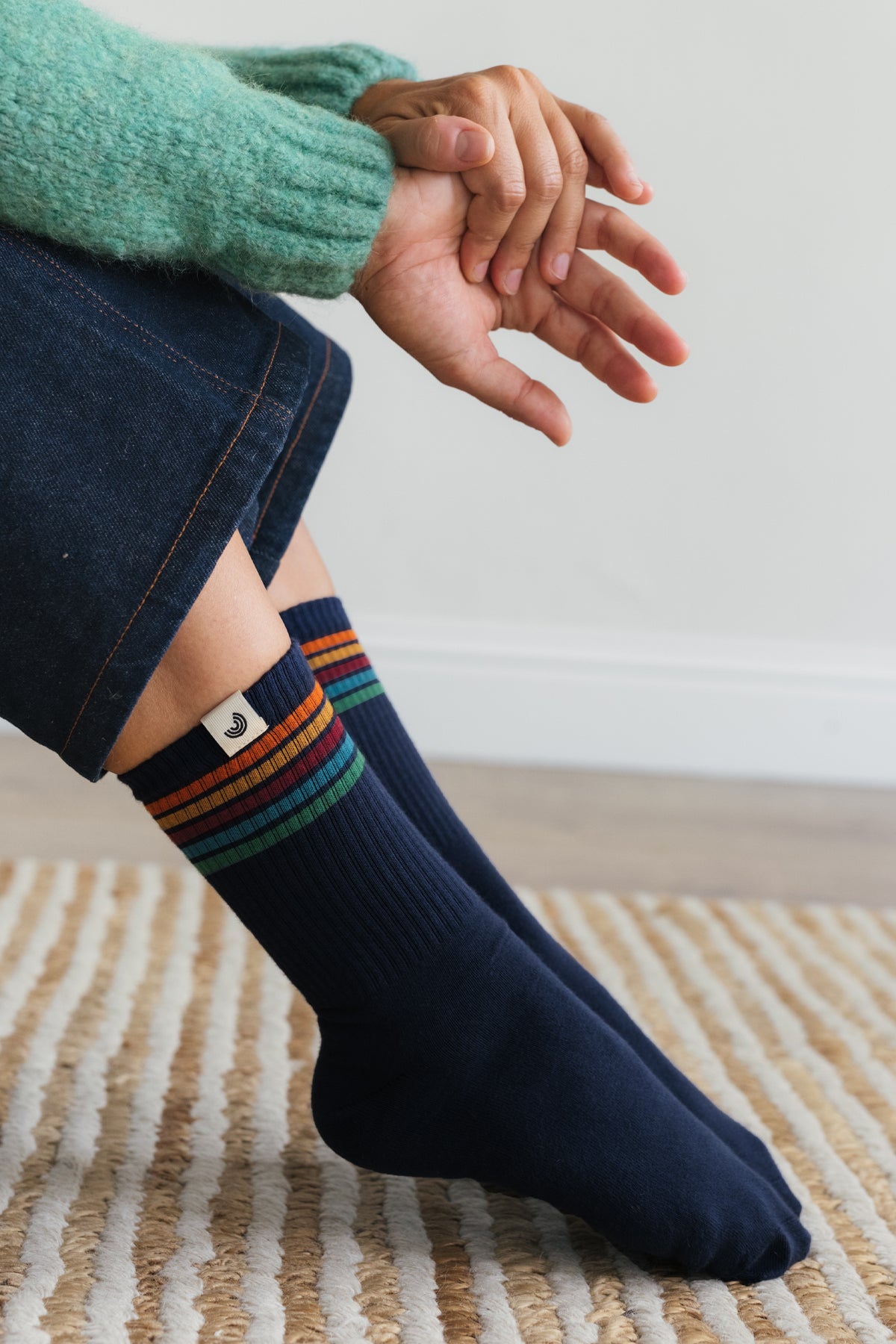 Wearing sustainable navy striped socks
