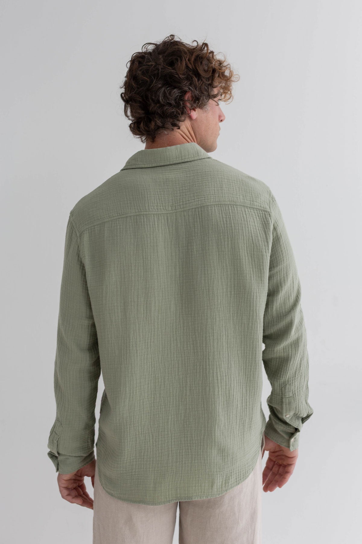 Light green muslin shirt men light pants wear view back
