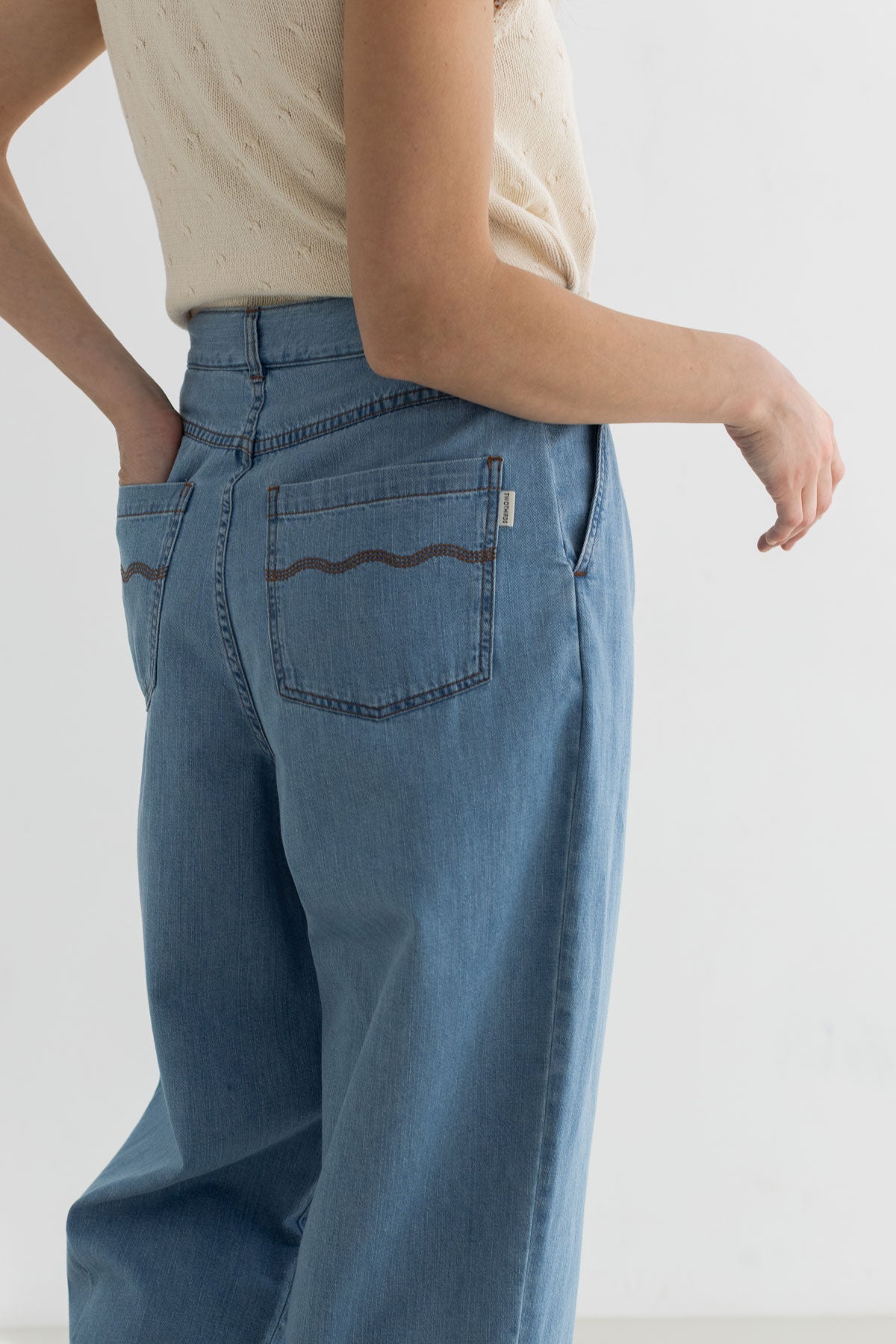 Light blue organic cotton denim pants women knit top detail back