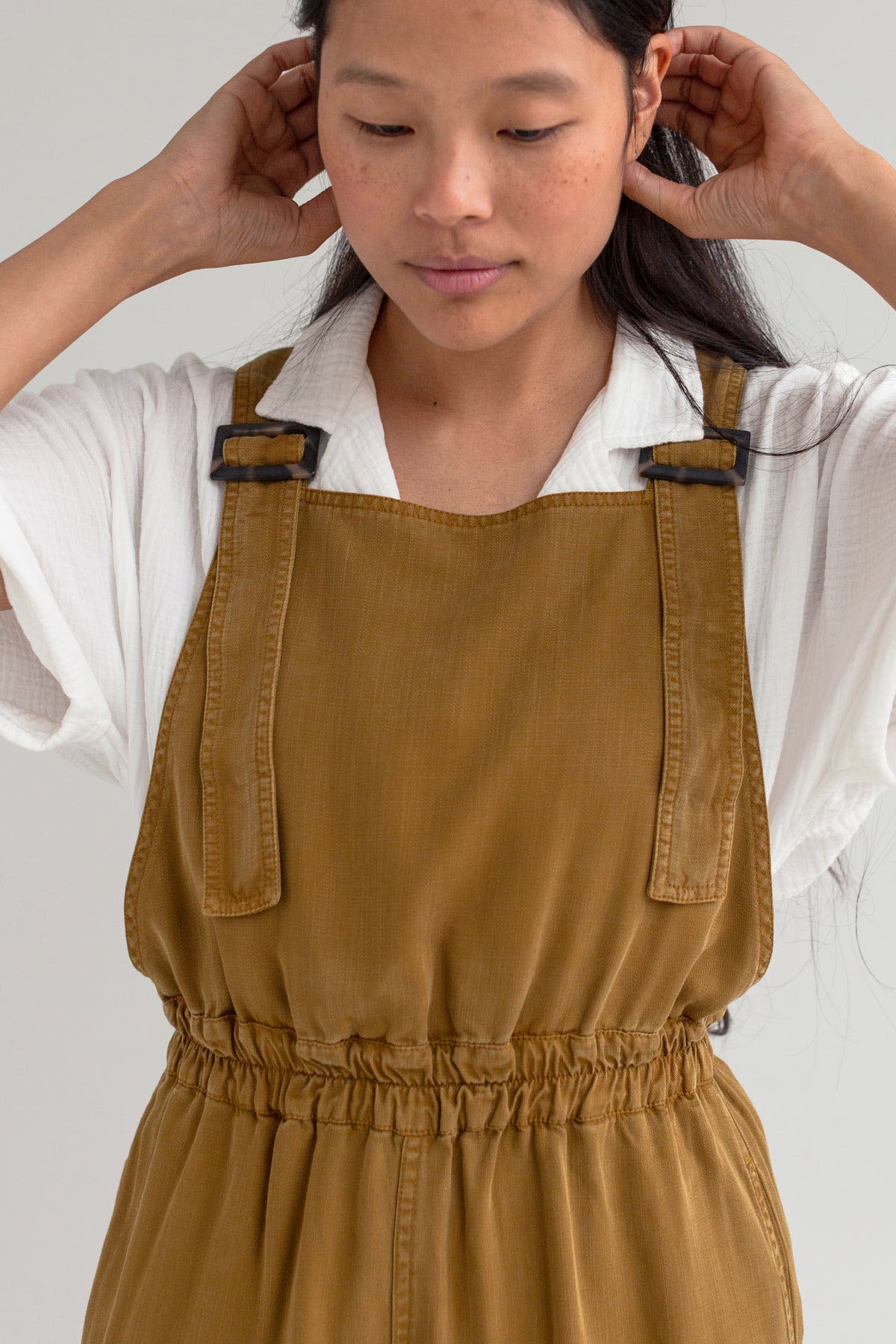 Dijon mustard overall women white shirt wear view front 