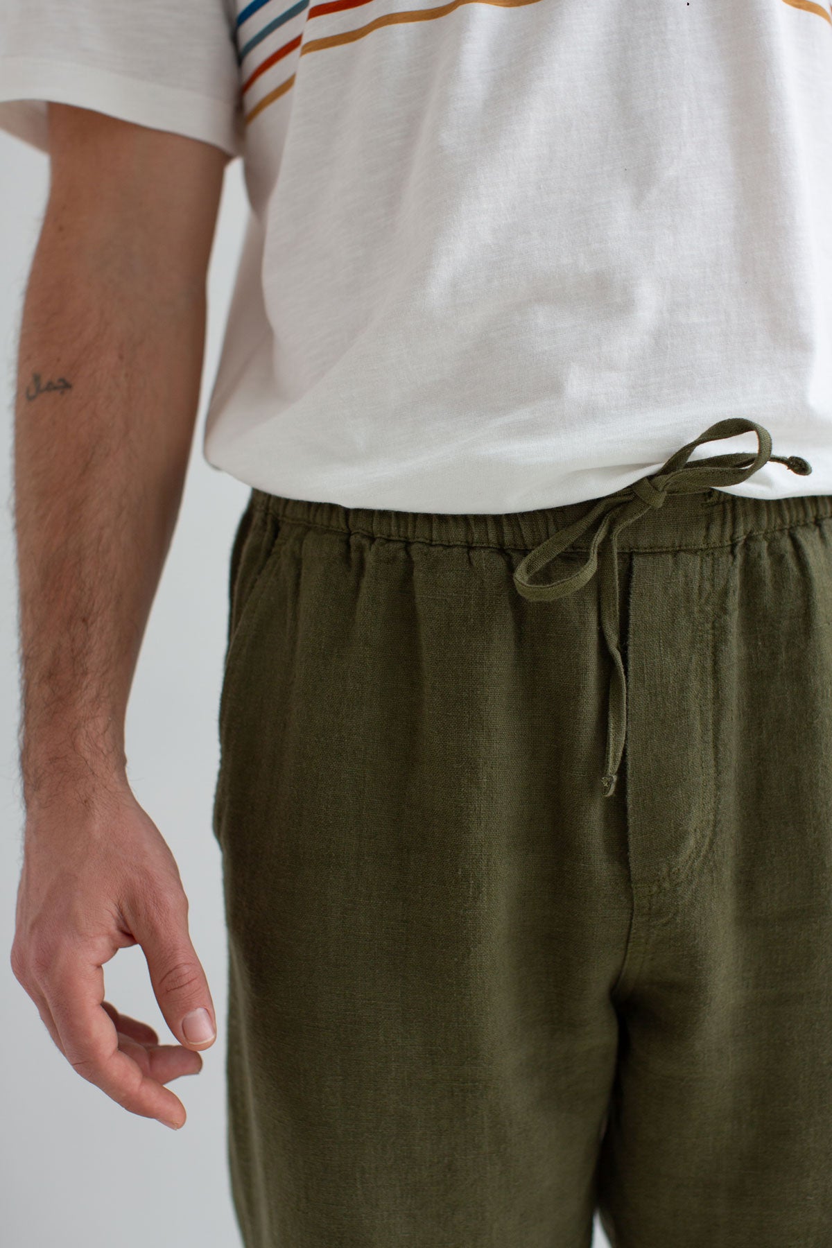 Codium green heavy linen pants men detail front
