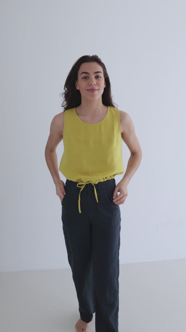 Blue night linen pants women golden green top full body view