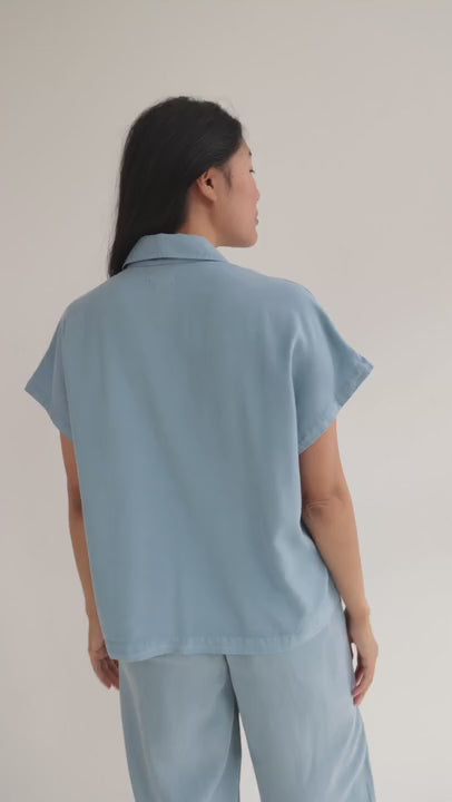 Denim blue lightweight shirt women light blue pants full body view 