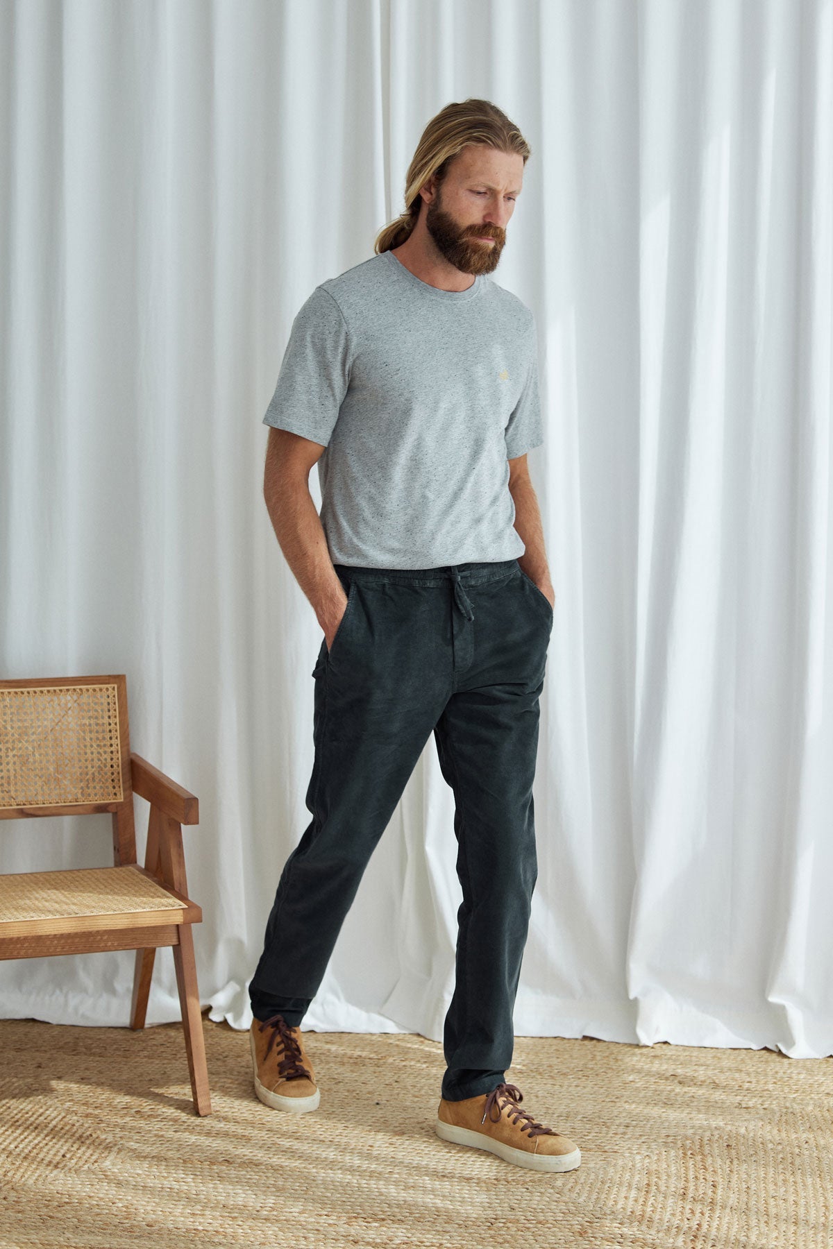 Dark sand corduroy pants men tshirt grey full body view front